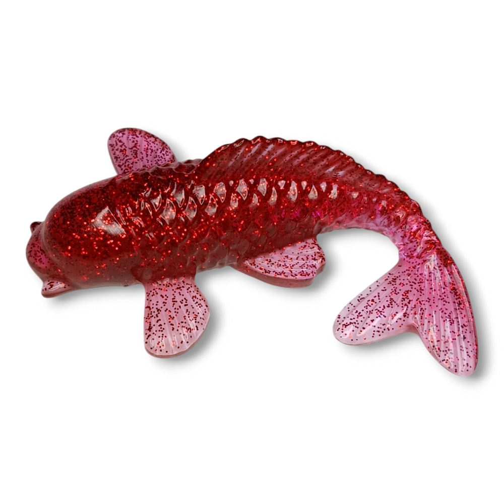 Vibrant Red Decorative Koi Fish Figurine with Textured Scales and Prominent Fins